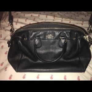 Black coach handbag with optional crossbody strap
